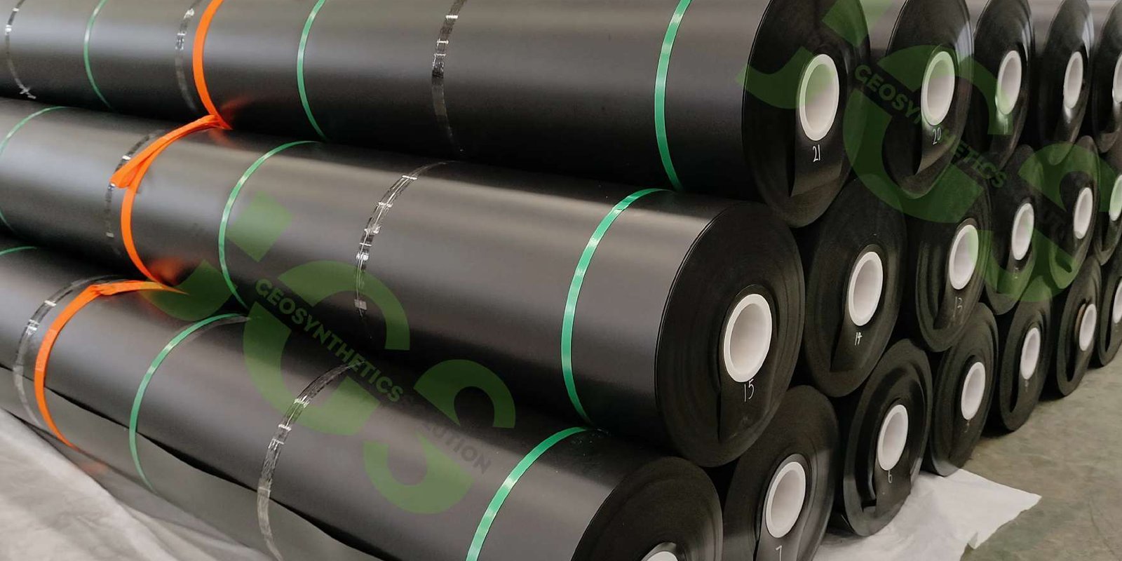 Black HDPE geomembrane rolls prepared for containment projects