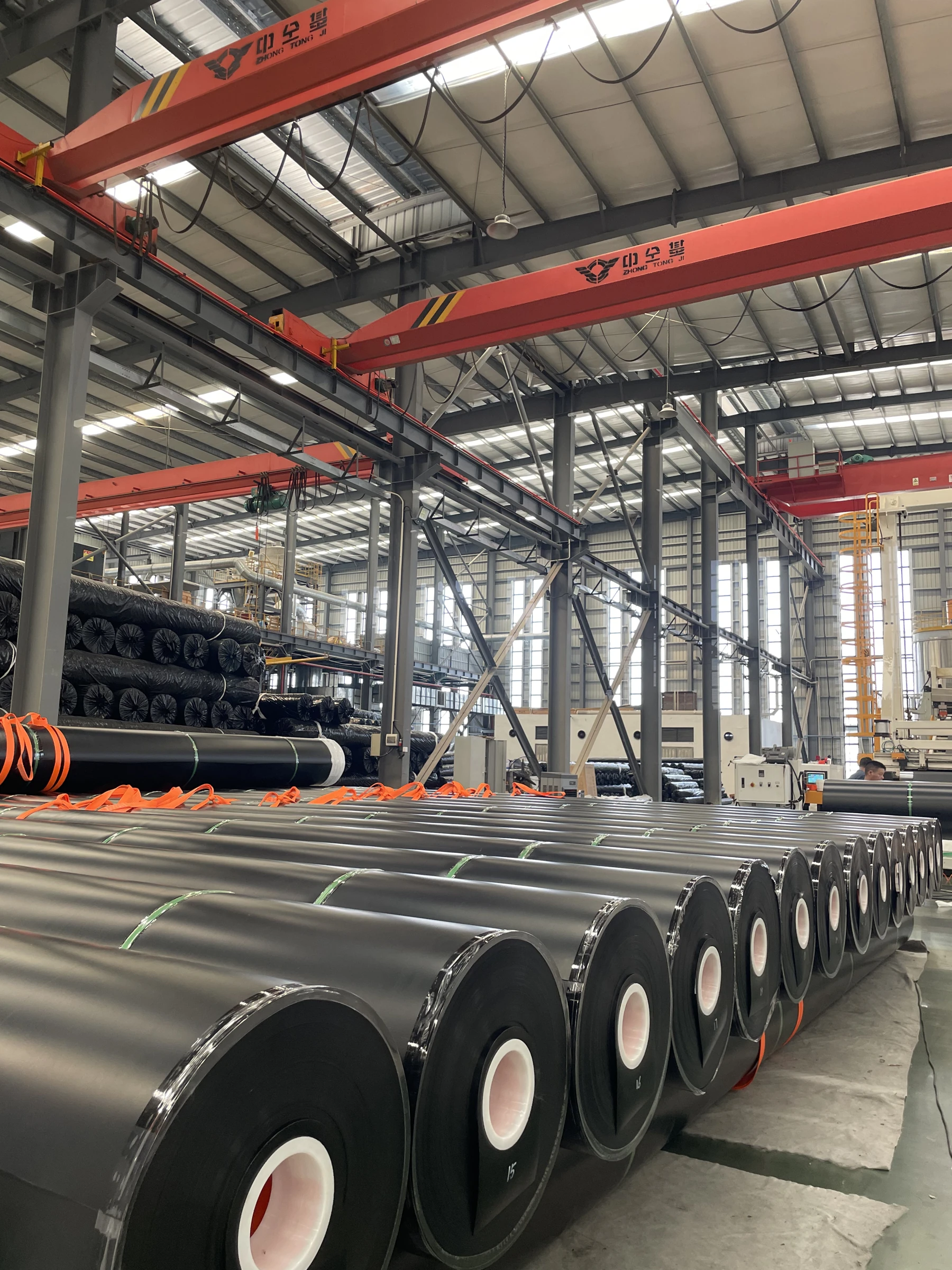 HDPE geomembrane rolls stored inside the Jinseed factory