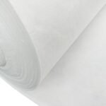 Close-up of a white nonwoven geotextile roll and its fibrous surface