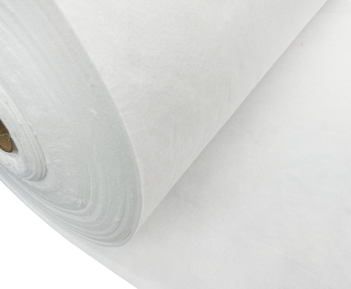 Close view of a white PET non-woven geotextile roll