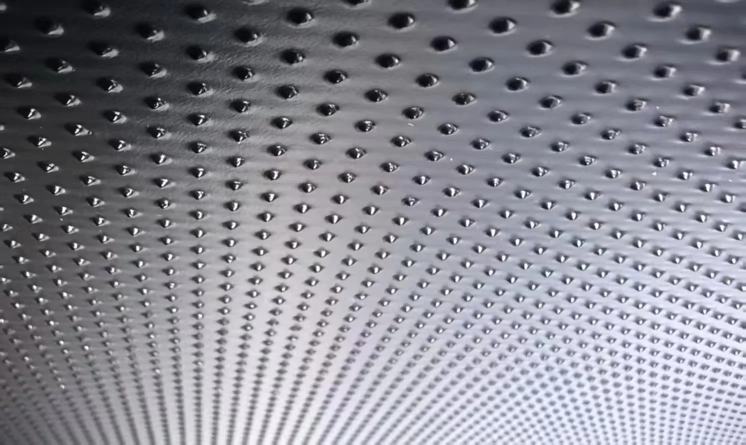 Textured geomembrane surface