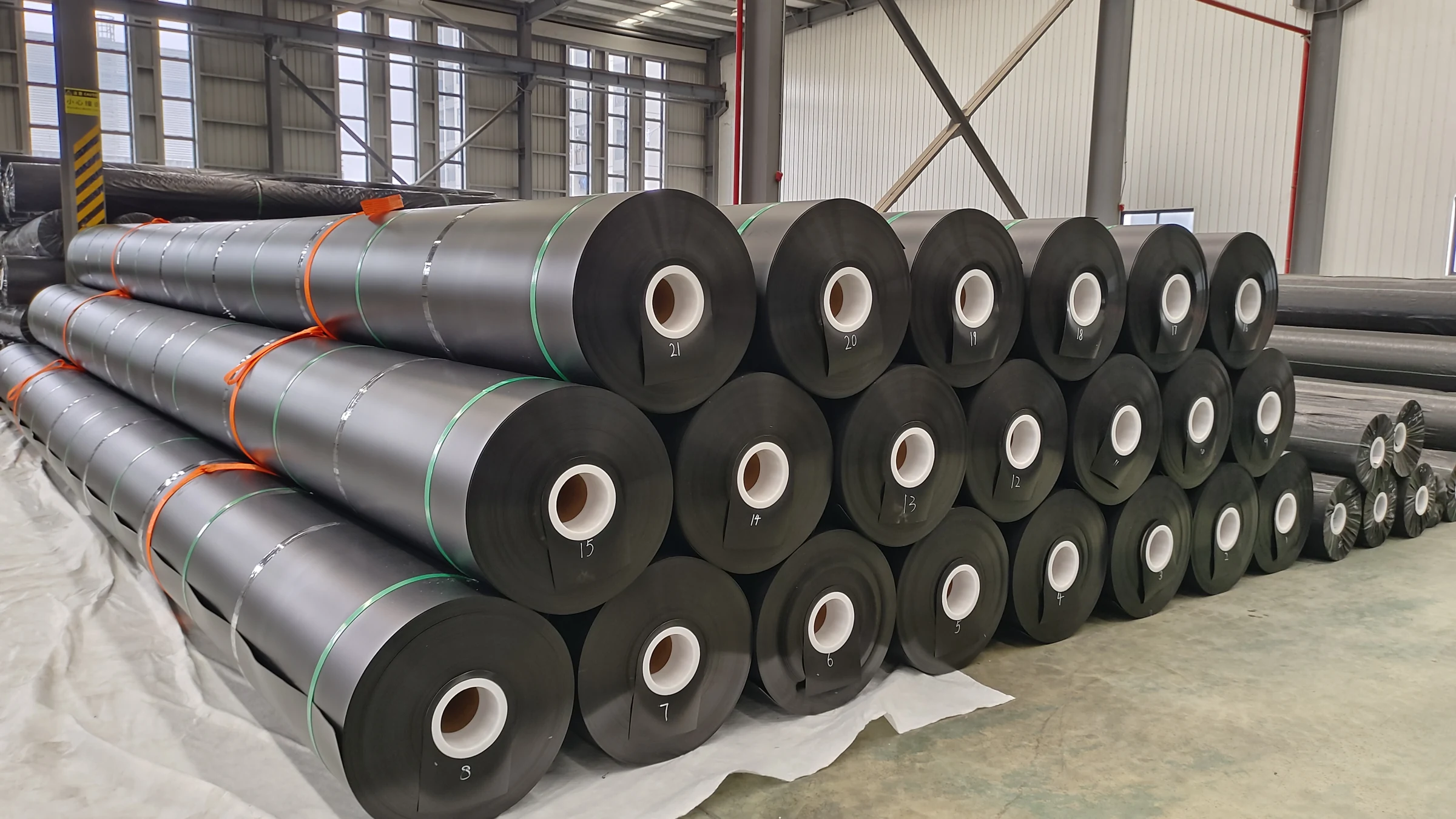 Geomembrane rolls stored in the factory