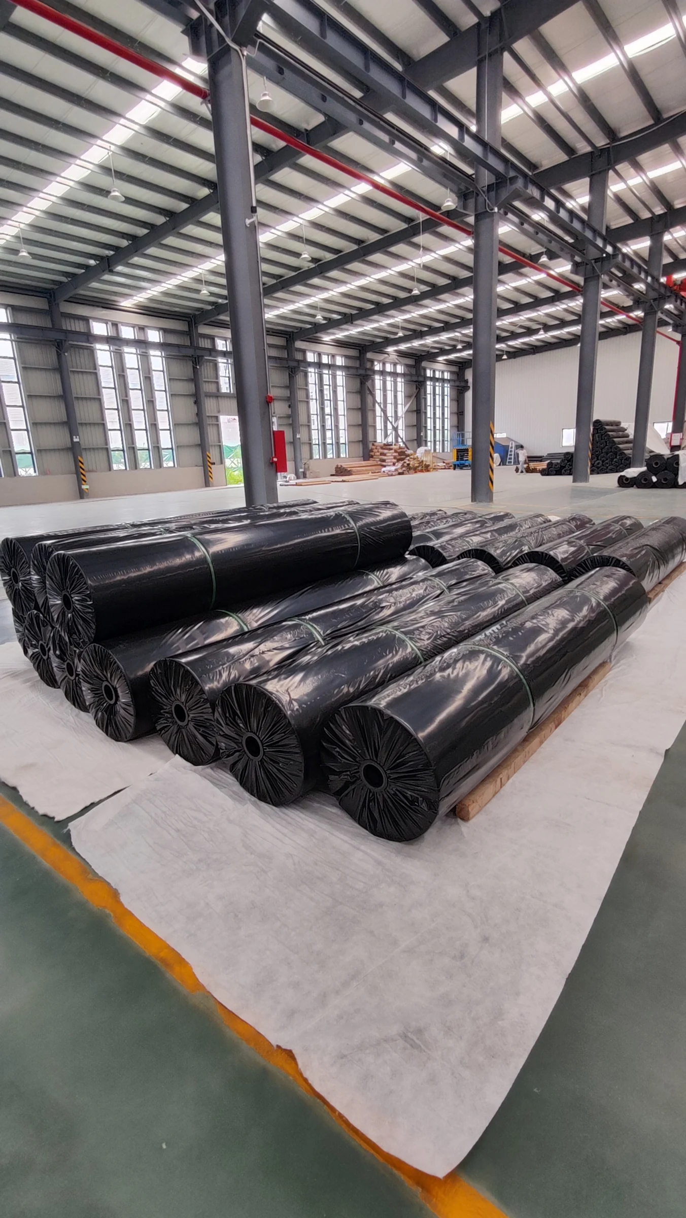 Wrapped geotextile rolls prepared for shipment