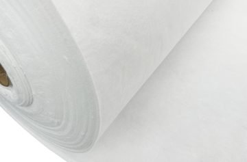 Close-up of a white nonwoven geotextile roll and its fibrous surface